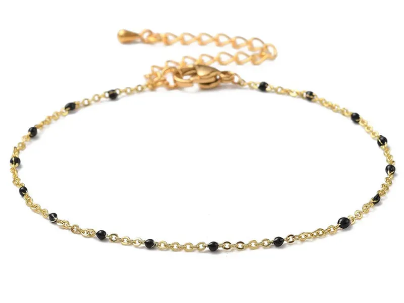 La Petite Epicerie Armband emaille stippen zwart goud 18,5 cm