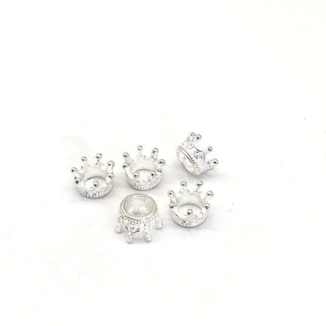 Bijounique Kroontje open bedel per stuk zilverkleur 8 mm