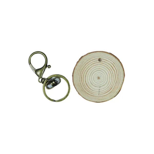 Astrid Brouwers boomstamschijf sleutelhanger hout 5-6 cm