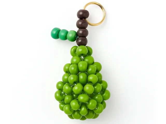 La Petite Epicerie bedel peer groen glasparels fruit