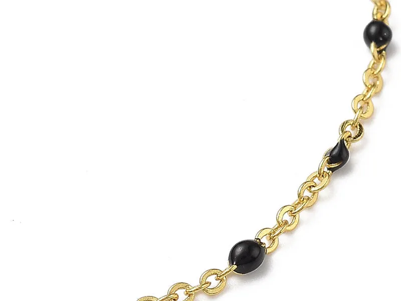 La Petite Epicerie Armband emaille stippen zwart goud 18,5 cm